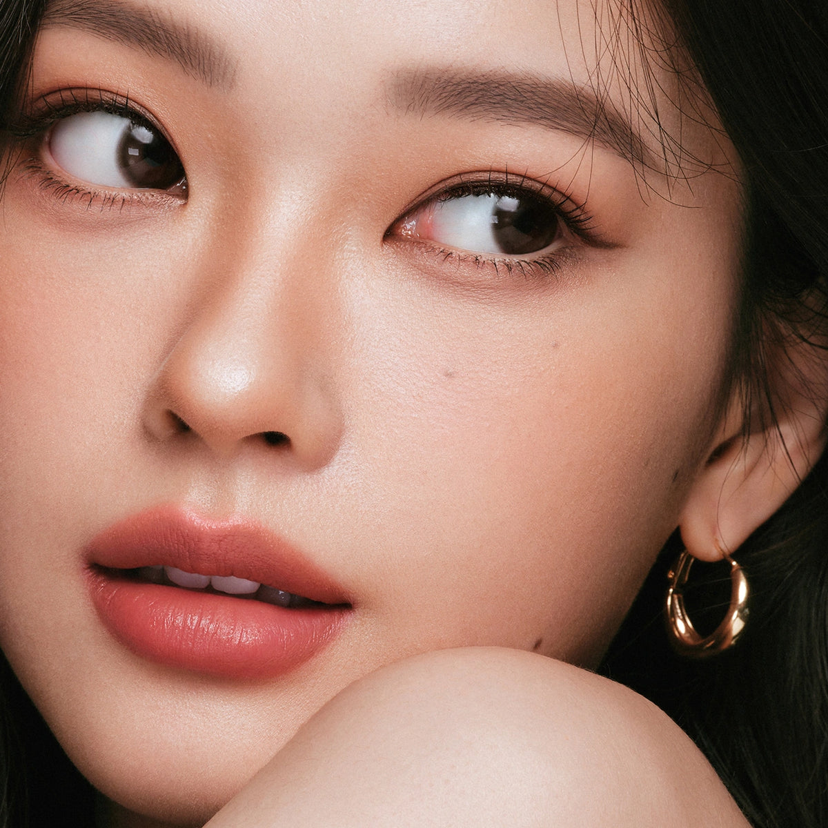 Model Wearing Judydoll Cushion Satin Lip Cream #S01 Fig Ganache